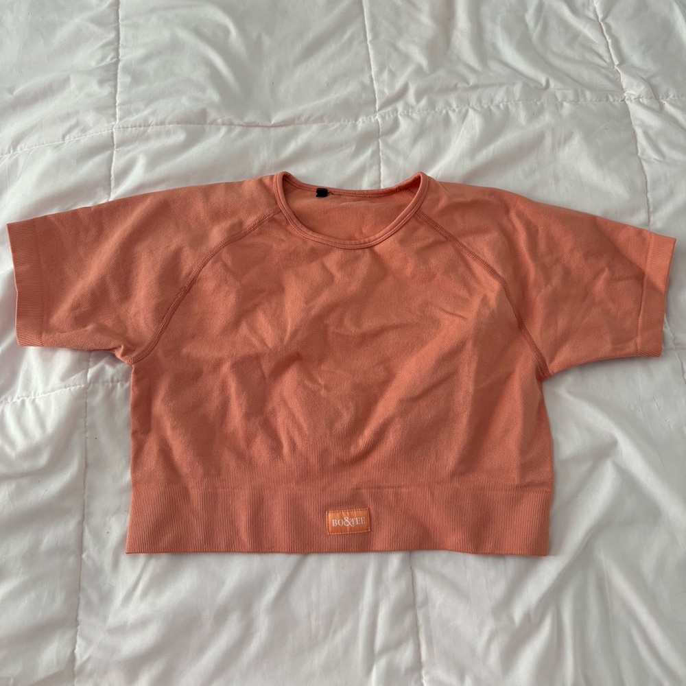 Bo+Tee cropped workout top.